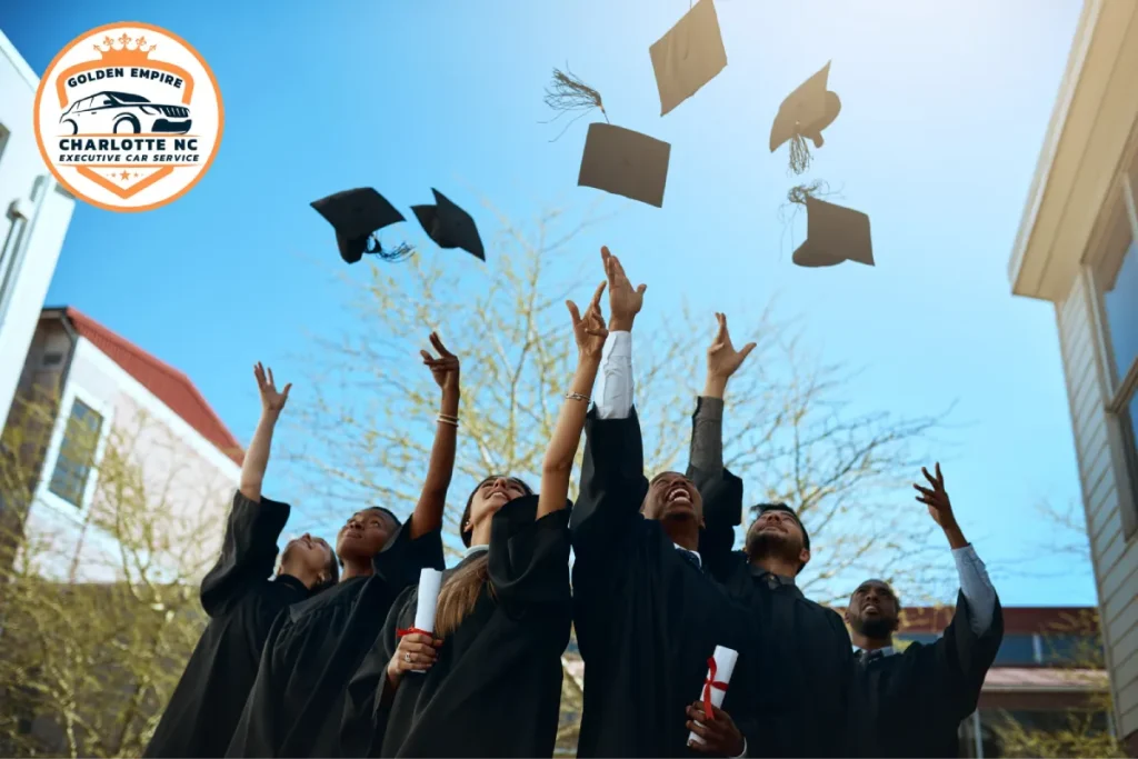 Group of graduates throwing their caps in the air, celebrating.