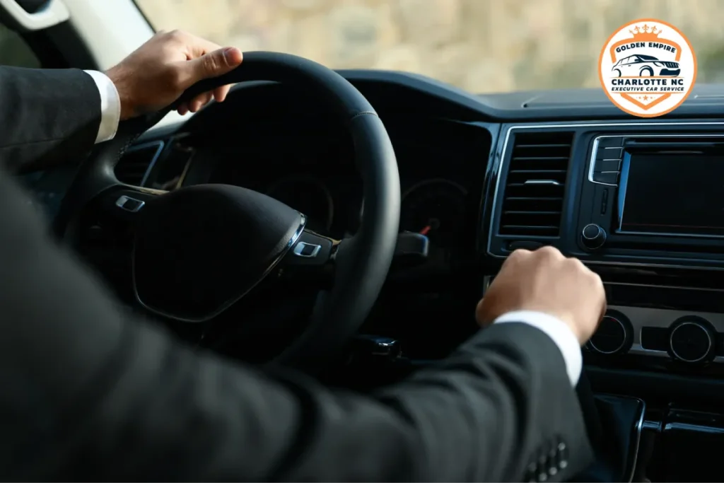 Professional driver behind the wheel for concert transportation.